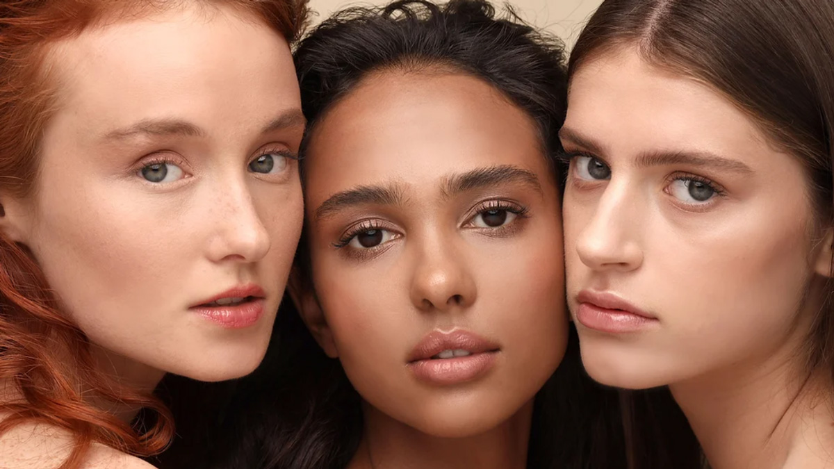 Three beautiful woman with different skin colors